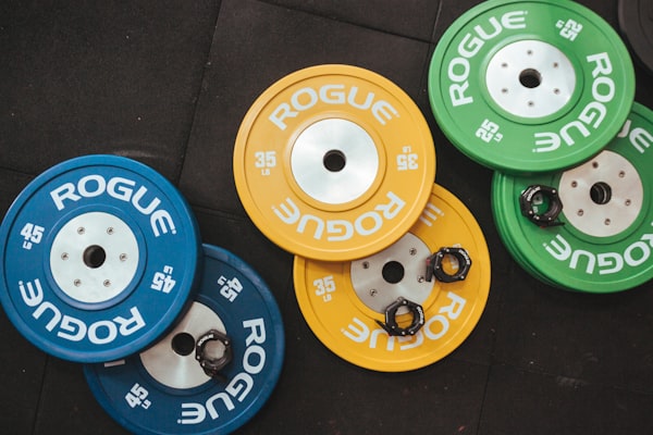 Barbell and weights representing structured programmes